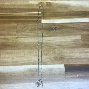 silver necklace with bumblebee theme charms